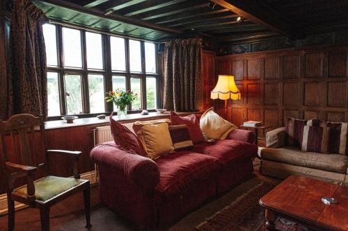 Oak Paneling and Mullioned Windows in Drawing Room